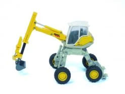 Siku 3548 Menzi-Muck Hydraulische-baggermachine -Bruderiku Winkel siku menzi muck m545 graafmachine geel grijs speelactief.nl 3